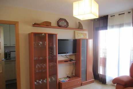 Salón con TV y salida a la terraza, Apartamento Costa Peñiscola, Peñiscola